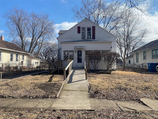 view of front of property with fence