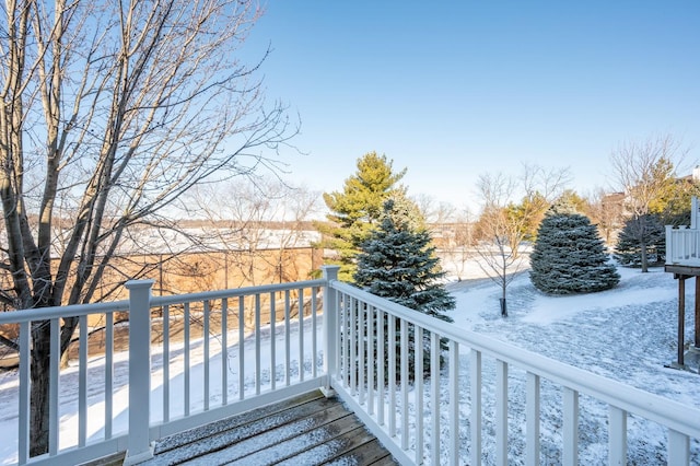 view of snow covered deck