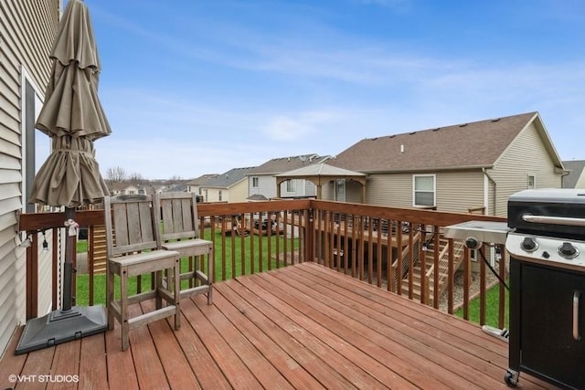 wooden deck with a residential view