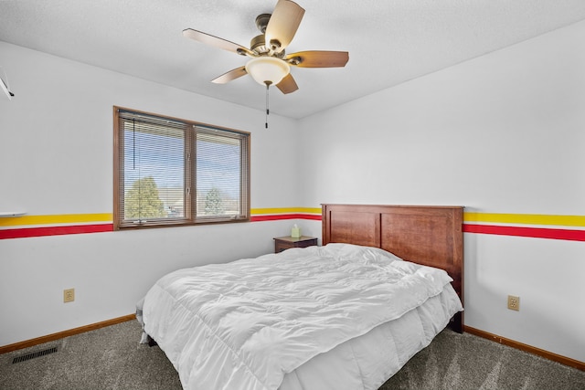 8001 Brookview Dr, Urbandale, IA 50322 - carpeted bedroom featuring baseboards and a ceiling fan