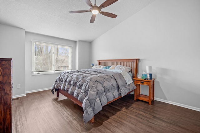 8001 Brookview Dr, Urbandale, IA 50322 - bedroom featuring wood finished floors, lofted ceiling, baseboards, a textured ceiling, and a ceiling fan