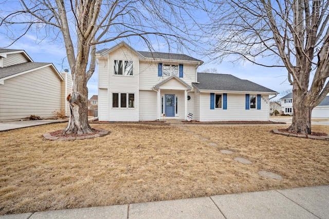 view of front facade featuring a front yard