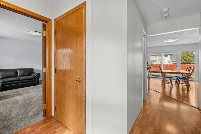 hall with light wood finished floors