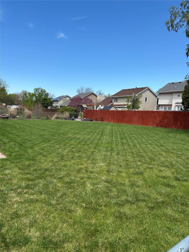 8001 Brookview Dr, Urbandale, IA 50322 - view of yard with a residential view