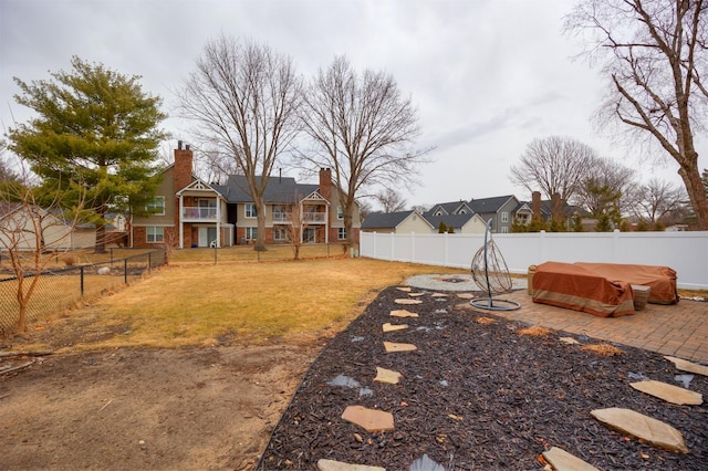 view of yard with a fenced backyard and a patio