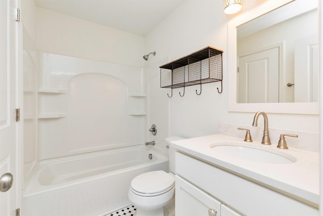 bathroom featuring vanity, toilet, and shower / bathtub combination