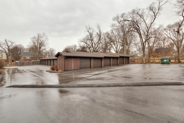 garage featuring fence