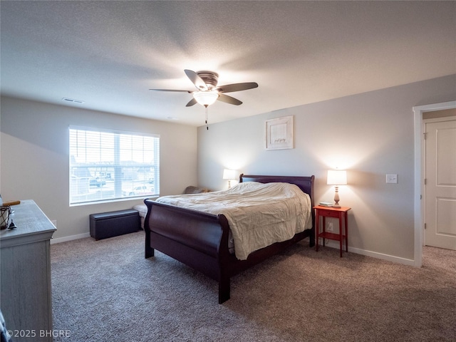 bedroom featuring ceiling fan, a textured ceiling, carpet floors, visible vents, and baseboards