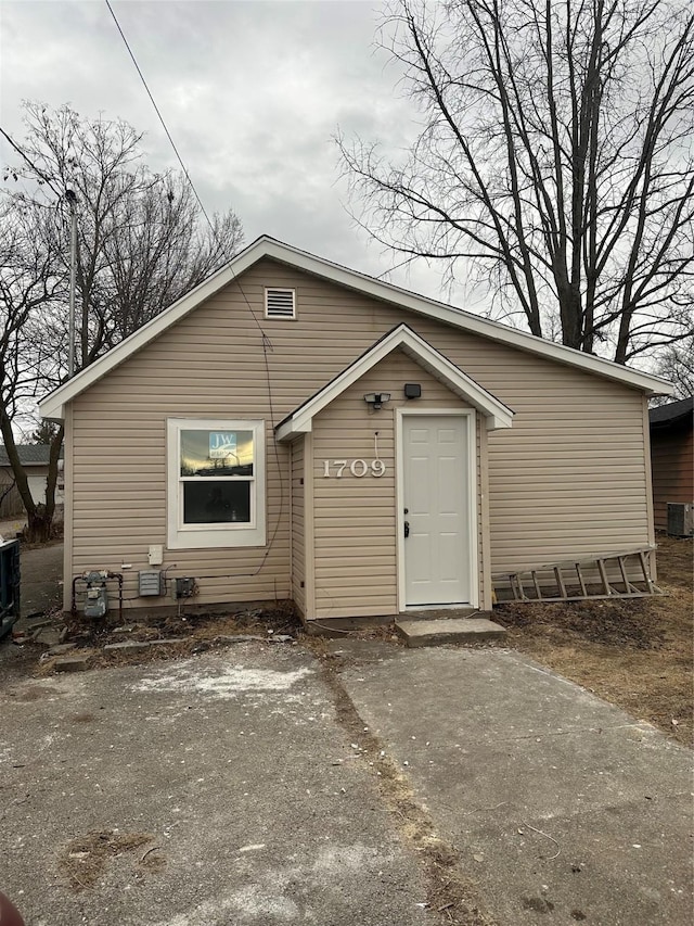 view of front of property featuring cooling unit