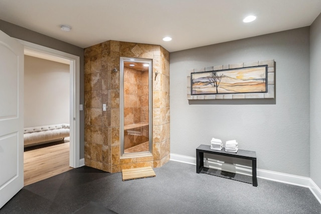 interior space featuring recessed lighting and baseboards