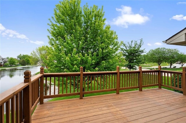 deck featuring a water view