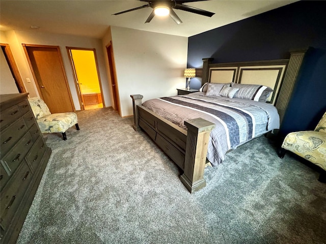 bedroom with a ceiling fan and carpet