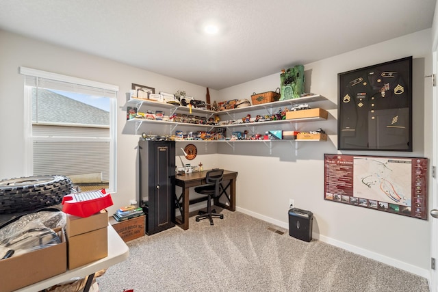 home office with carpet and baseboards