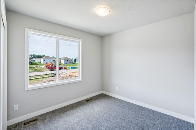 25091 Bluebird Cir, Adel, IA 50003 - spare room with carpet and baseboards