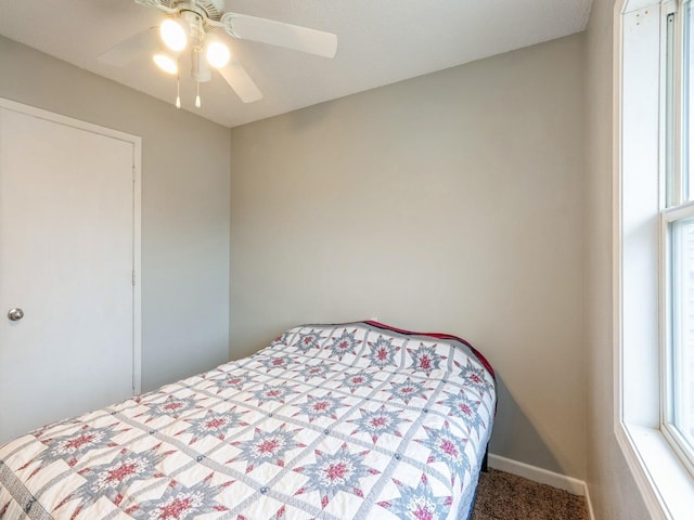 bedroom featuring carpet flooring, ceiling fan, and baseboards