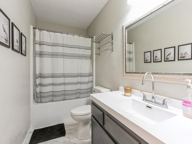 bathroom featuring shower / bath combo, marble finish floor, vanity, and toilet