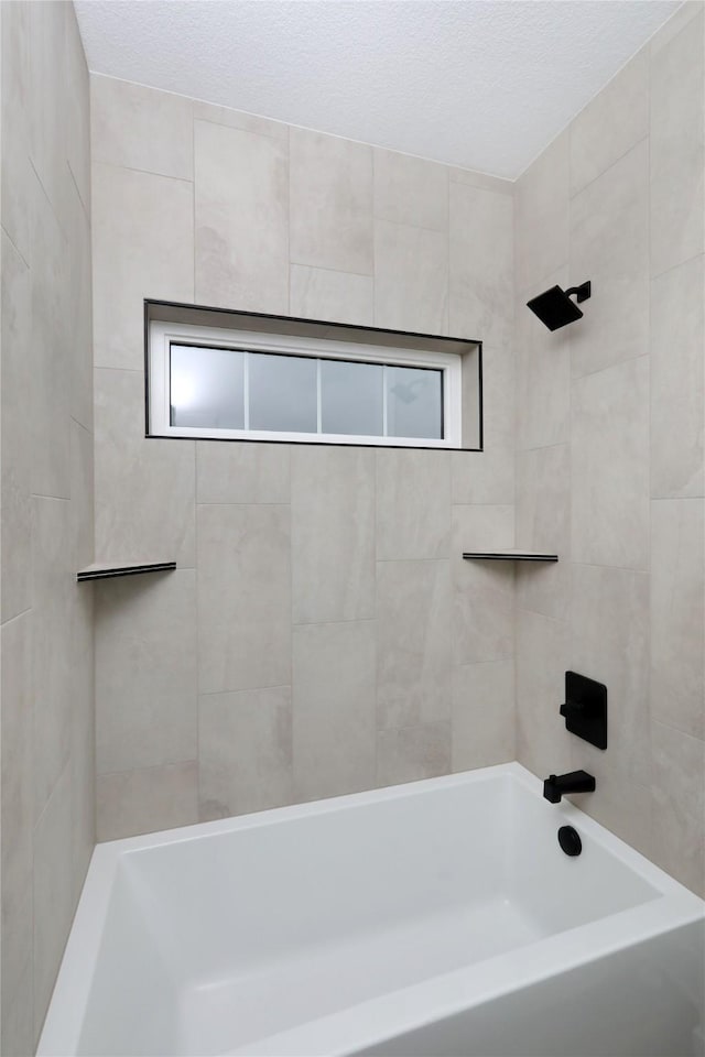 bathroom with a textured ceiling