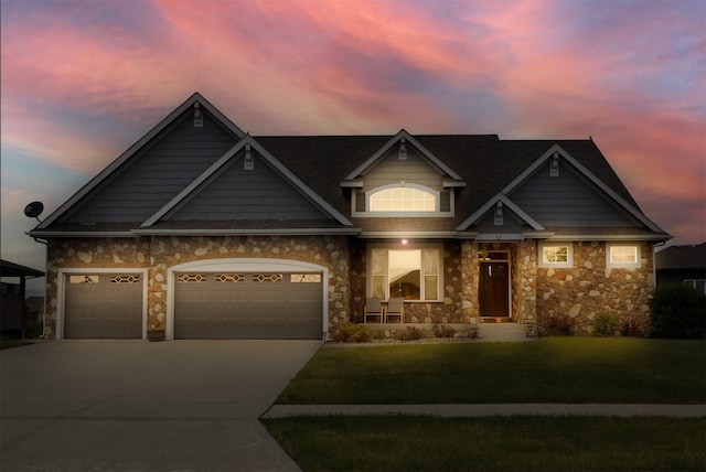 1306 NE 45th St, Ankeny, IA 50021 - craftsman-style home featuring a lawn, driveway, stone siding, and an attached garage