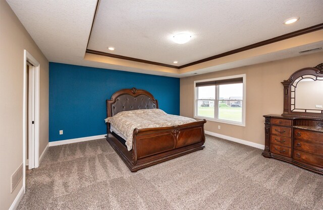 1306 NE 45th St, Ankeny, IA 50021 - bedroom with carpet flooring, baseboards, a tray ceiling, a textured ceiling, and recessed lighting