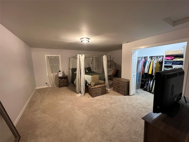 bedroom featuring baseboards and light colored carpet