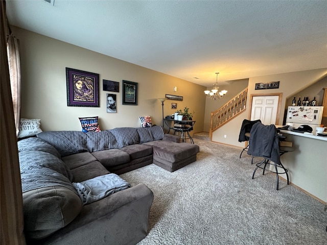 carpeted living room with a textured ceiling, stairs, and a notable chandelier