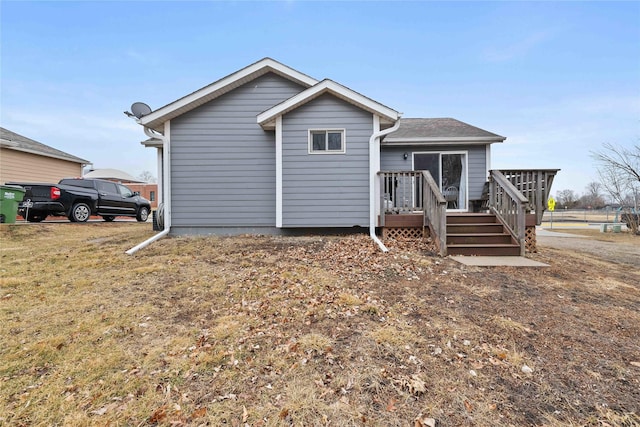 view of front of house featuring a wooden deck