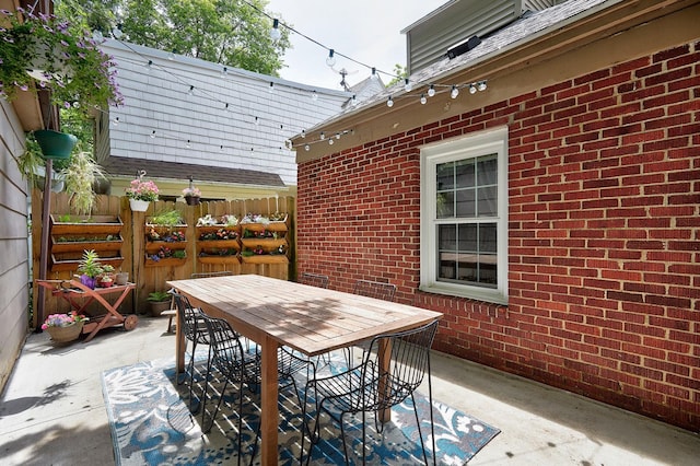 view of patio / terrace with fence and outdoor dining space