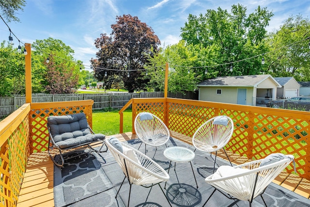 2201 Merle Hay Rd, Des Moines, IA 50310 - wooden deck featuring outdoor dining space