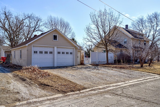 detached garage with fence