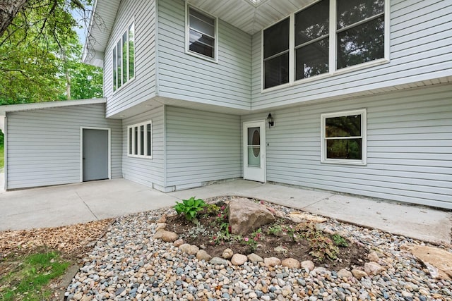 doorway to property featuring a patio area