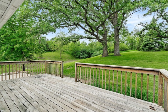 deck featuring a lawn