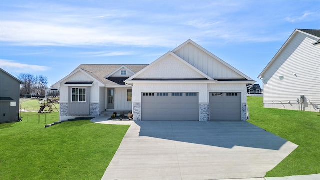 view of front of property featuring a front yard, a garage, board and batten siding, and driveway