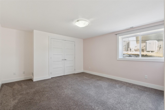 10598 NW 72nd Ln, Johnston, IA 50131 - unfurnished bedroom featuring carpet, a closet, and baseboards