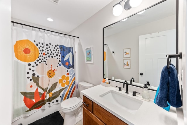 bathroom with toilet, recessed lighting, a shower with shower curtain, and vanity