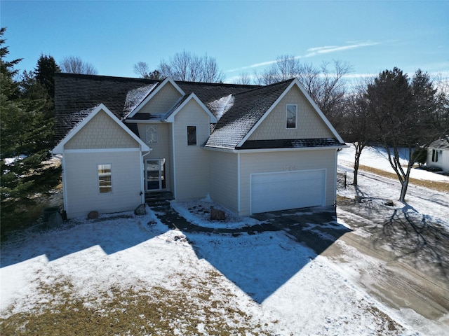 view of front of home with a garage and driveway