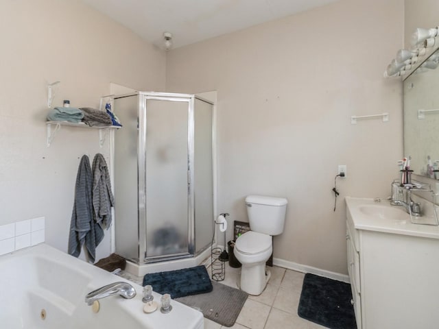 bathroom with tile patterned floors, toilet, a stall shower, a jetted tub, and vanity