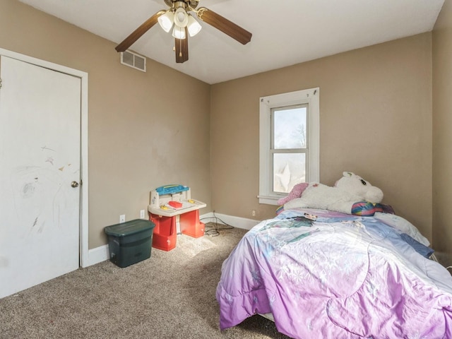 bedroom with visible vents, a ceiling fan, baseboards, and carpet floors