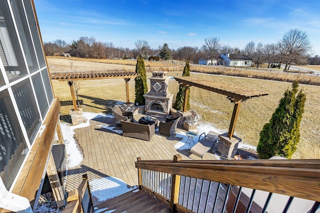 wooden deck featuring a patio area, an outdoor living space with a fireplace, and a pergola