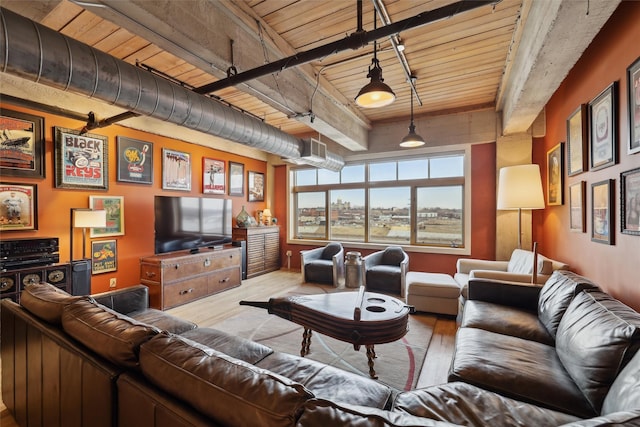 100 Market St Unit 409, 408, 407, Des Moines, IA 50309 - living room with wood finished floors and wooden ceiling with exposed beams