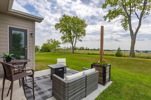 exterior space featuring a patio, a rural view, and fence