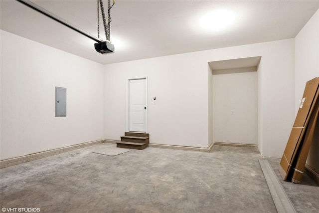 2908 Yordi Dr, Norwalk, IA 50211 - garage featuring a garage door opener and electric panel
