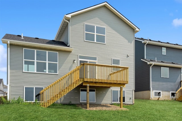 2908 Yordi Dr, Norwalk, IA 50211 - back of house with a wooden deck, a lawn, and stairway