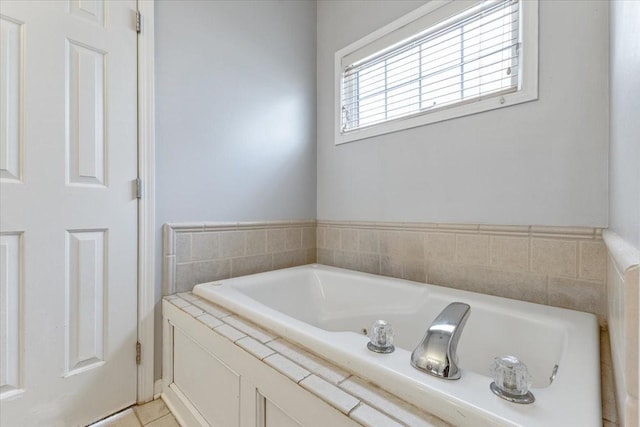 bathroom featuring a bath