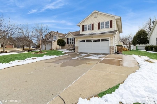 traditional home with a garage, concrete driveway, and brick siding