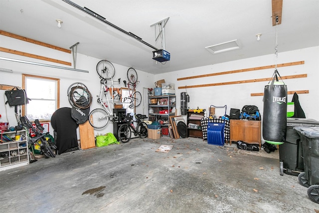 garage featuring a garage door opener