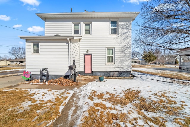 502 E Douglas St, Knoxville, IA 50138 - view of snow covered back of property