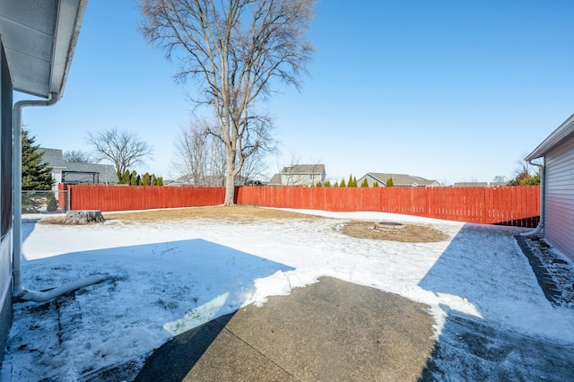 view of yard with a fenced backyard