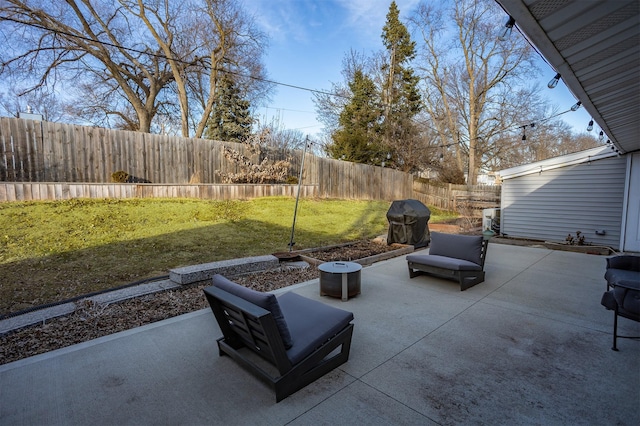 view of patio with a fenced backyard and area for grilling