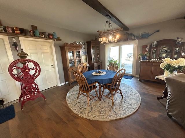 dining space with a chandelier, dark wood-style flooring, beamed ceiling, and baseboards