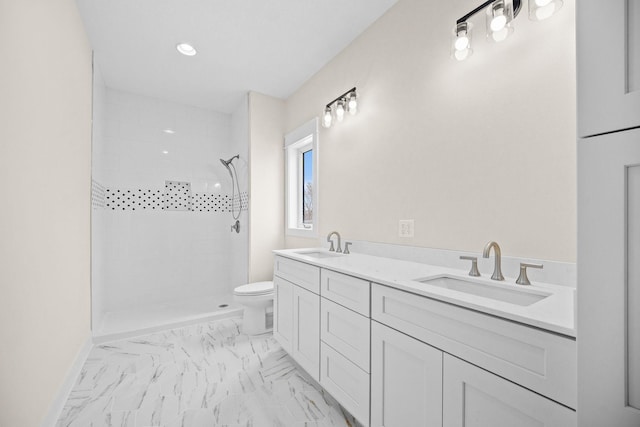 full bath featuring toilet, marble finish floor, a sink, and tiled shower